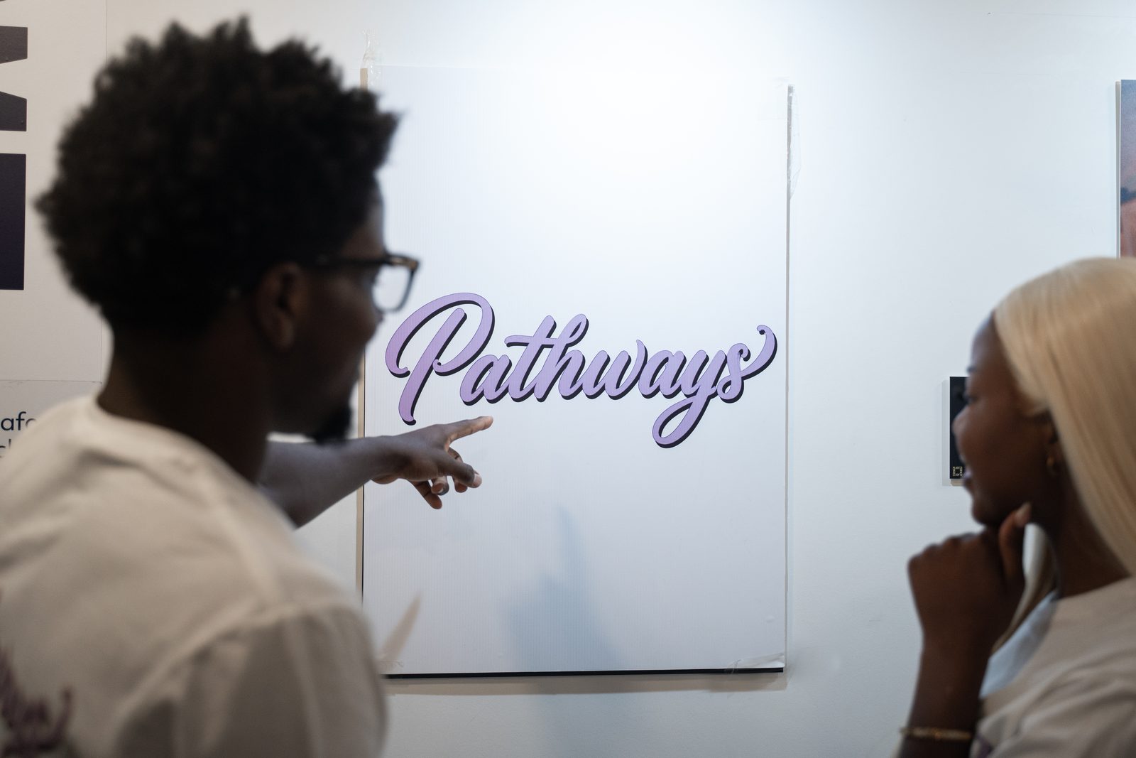 Talking under the Pathways canvas