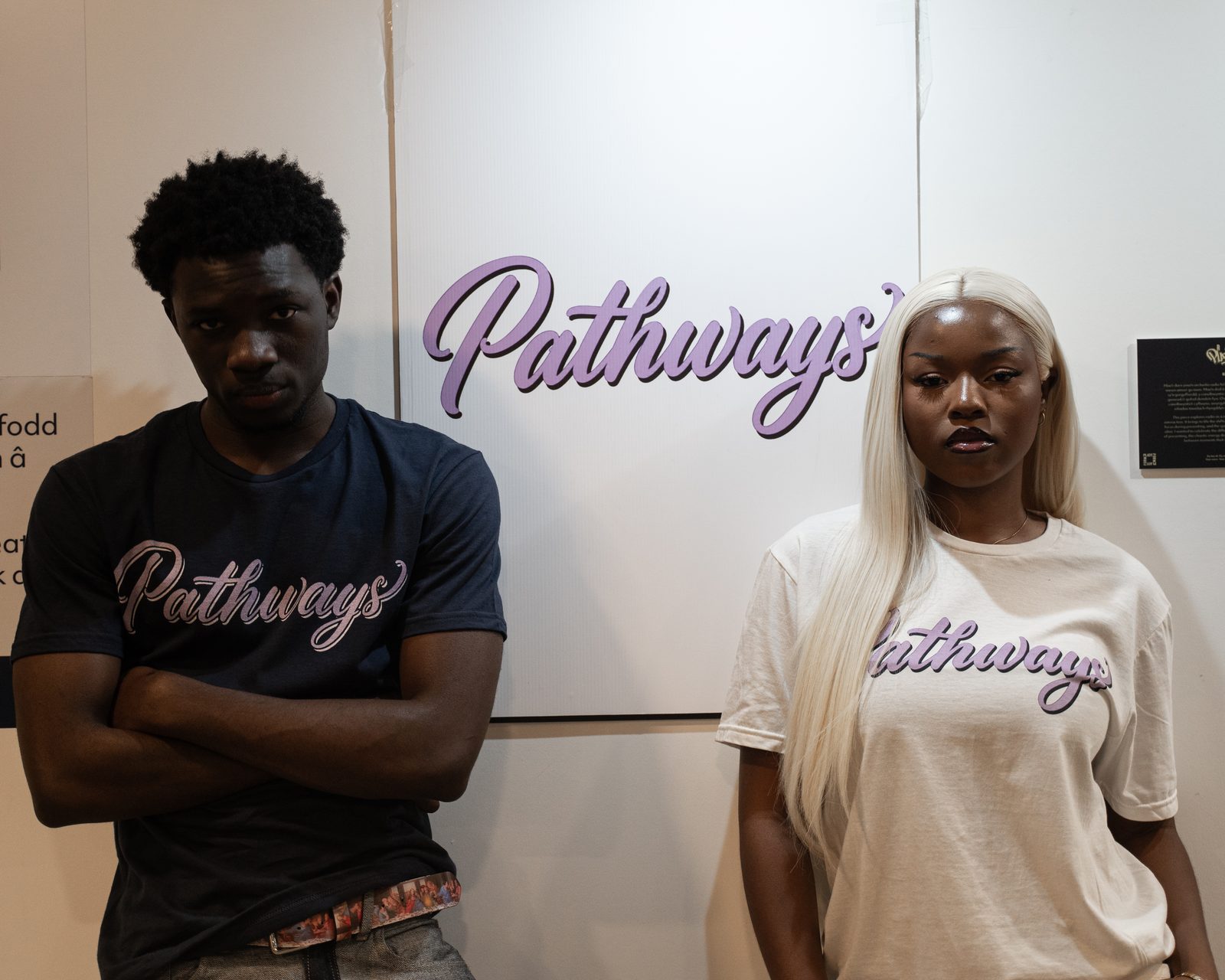 Two of the community under the logo